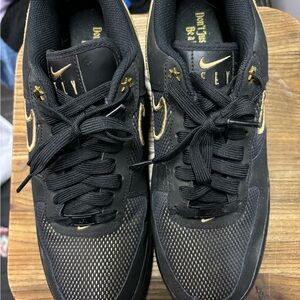 Nike Women's Sneakers Black and Gold